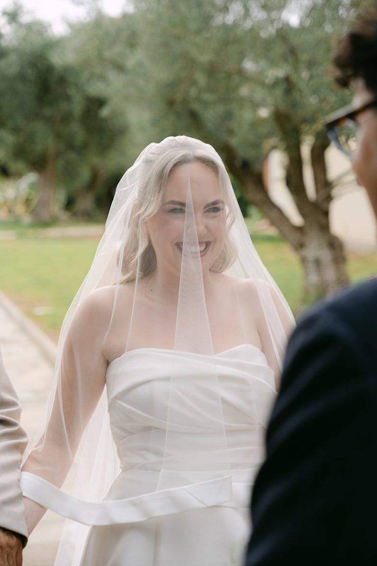 George & Nafsika, wedding in Aigio: the bride under the veil