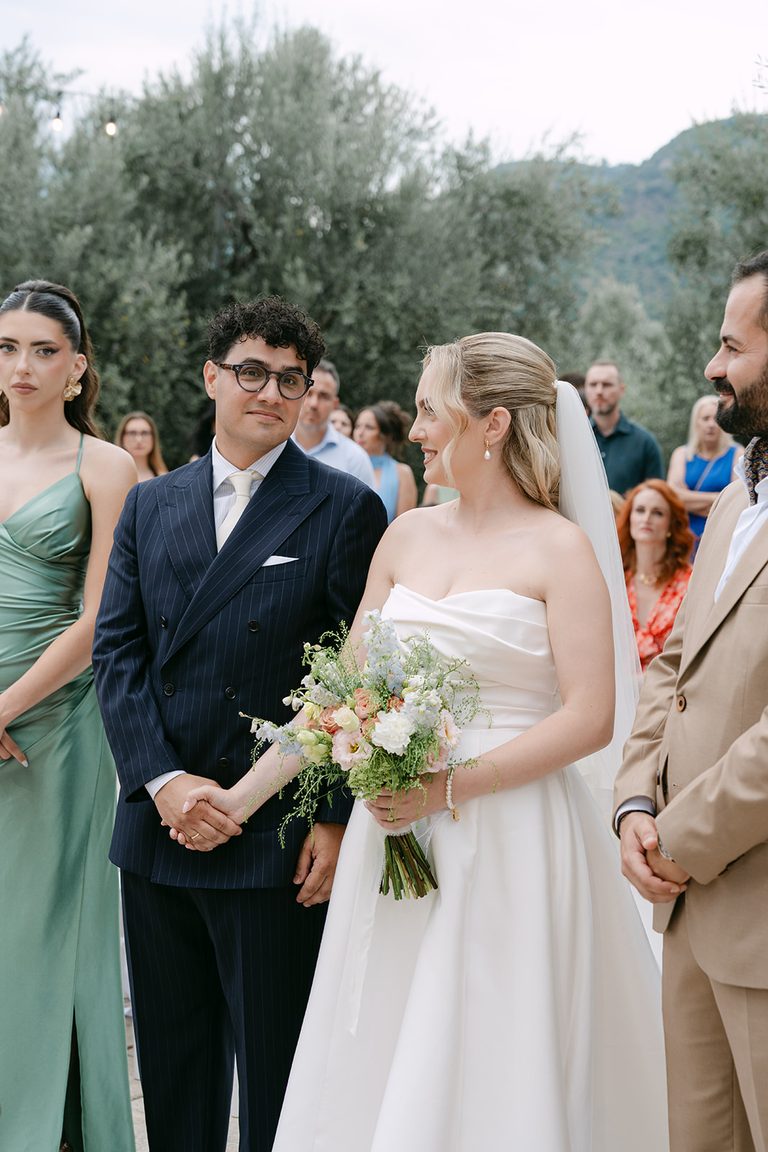 George & Nafsika, wedding in Aigio: outdoor ceremony under the olive tree