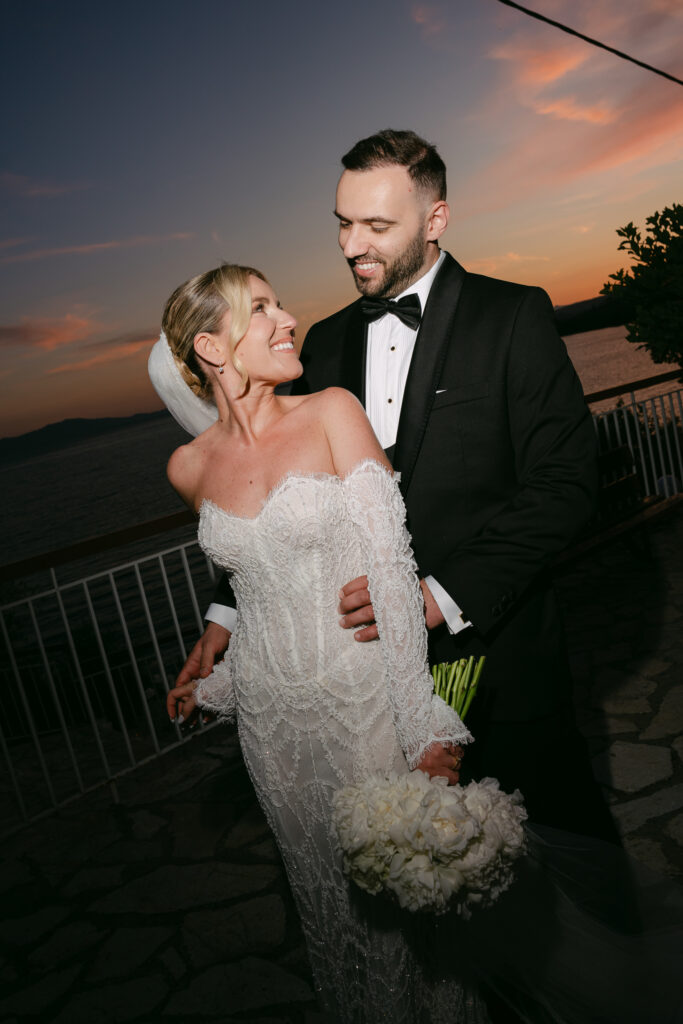 Dimitris & Panagiota, wedding in Agrinio: the couple at sunset on their wedding day