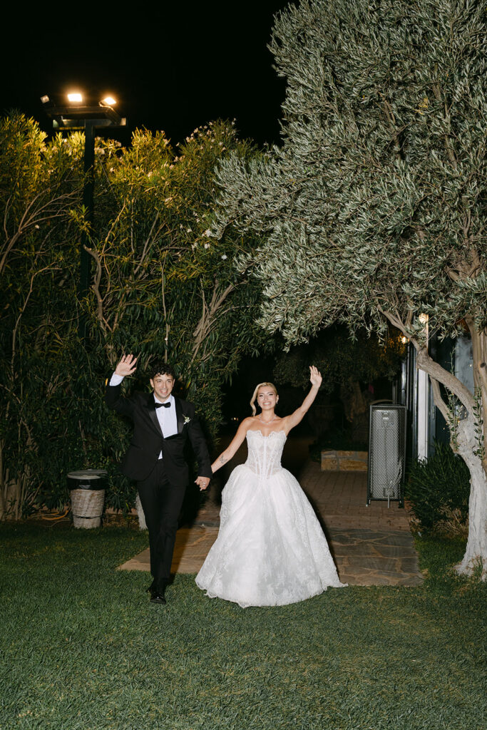 Konstantinos & Katerina, wedding in Athens: the couple arriving at night among the olive trees