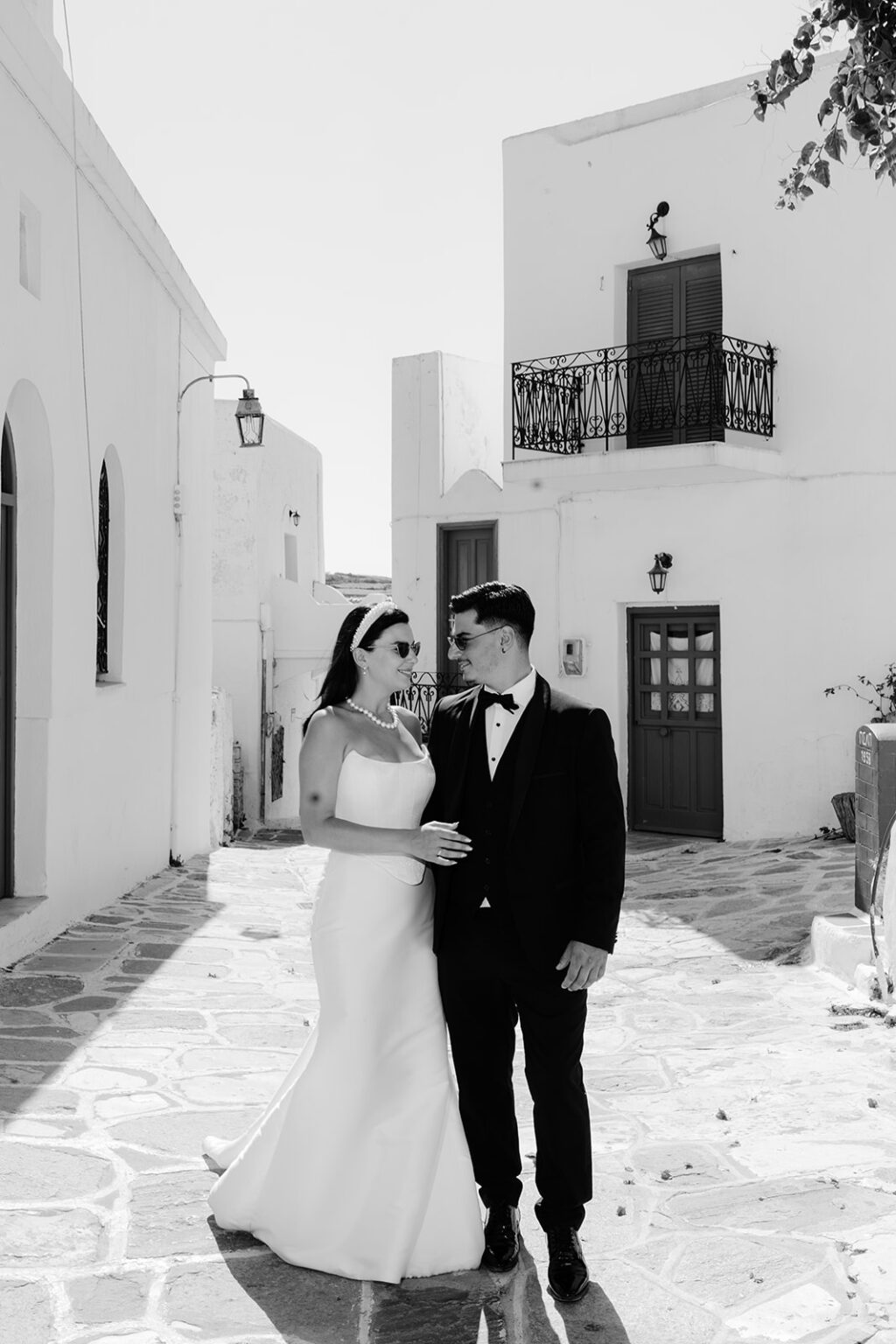 Bride and groom in the whitewashed lanes of Paros