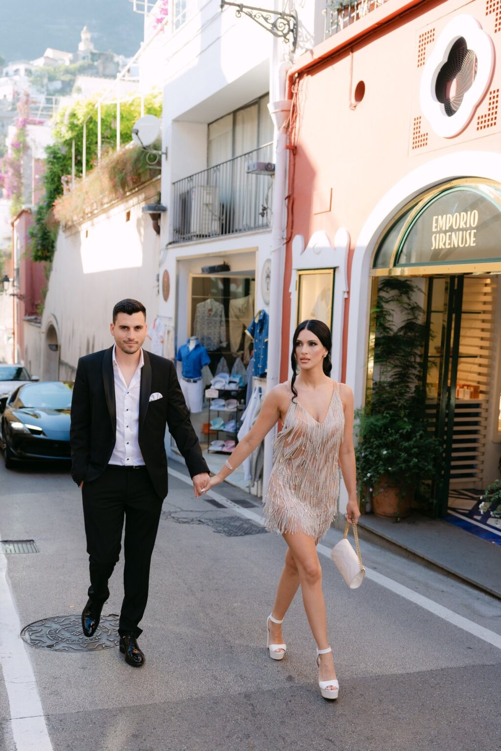 Couple walking through the lanes of Positano